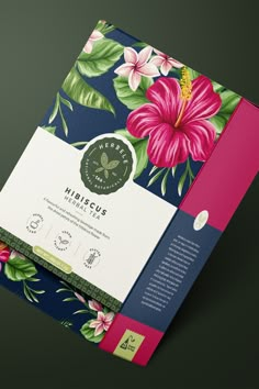 the front and back cover of a book with pink flowers on blue, green and pink