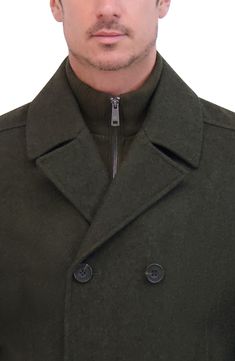 Add this classic wool peacoat to your wardrobe for an elevated style. Notched collar Long sleeves Button front Dual pockets 58% wool, 35% polyester, 4% acrylic, 3% other fibers Dry clean Imported Model stats: 6'1" height, 32" waist. Model is wearing size M. Wool Peacoat With Lapel Collar And Double-breasted Button, Modern Long Sleeve Pea Coat With Double-breasted Buttons, Collared Double-breasted Pea Coat For Fall, Fall Collared Double-breasted Pea Coat, Double-breasted Wool Outerwear With Pockets, Winter Business Peacoat With Double-breasted Button, Wool Peacoat With Double-breasted Button Fastening, Wool Peacoat With Lapel Collar And Pockets, Wool Long Sleeve Double-breasted Pea Coat