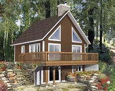 this is an artist's rendering of a cabin style home in the woods,