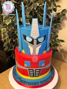 a birthday cake with a transformer theme on it