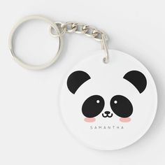 a panda keychain with the name samantaha on it's face