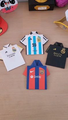 there are many different items on the table to be used as gifts for soccer fans