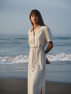 The Ifeni Dress is crafted from Linen Rayon blend which naturally evoke memories of long summer days due to their fluid nature. The dress features side splits for ease of movement and comes with a detachable rope. 20% Linen and 80% Rayon V-neck Detachable rope Side splits Color: Natural Stripe Material: 20% Linen and 80% Rayon Care instructions: Machine wash at max. 30ºC/86ºF with short spin cycle. Do not tumble dry. Please be sure to avoid rubbing against rough surfaces and be careful when wear Side Splits, Spin Cycle, Summer Days, Jumpsuit Dress, Care Instructions, The Dress, Dress Outfits, Shirt Dress, Jumpsuit