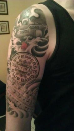 a man's arm with music notes on it and the words peper's jelly beans