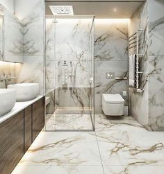 a bathroom with marble walls and flooring