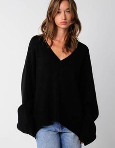 Our Elsie Sweater features a plunging v-neck and a oversized fit. 100% acrylic Made in China