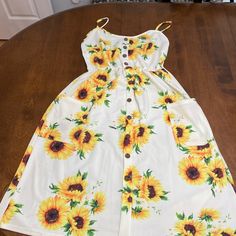 Nwt Zaful Sunflower Print Dress With Buttons And 2 Front Pockets. Size Us 8. Please See All Photos As They’re Apart Of The Description. For More Details About Us Please Read Our Store Bio. Thanks! -Sbb Zaful Dresses, Sunflower Print, Size 8 Dress, Yellow White, Product Description, Print Dress, Sunflower, Yellow, Womens Dresses