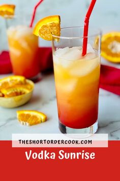 two glasses filled with orange juice and garnished with an orange slice on the rim