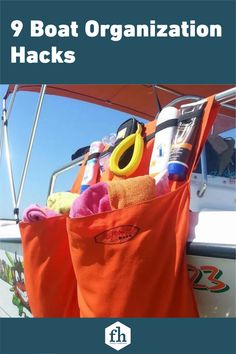 an orange bag filled with items on top of a boat