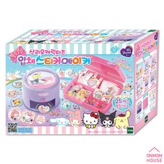 the hello kitty toy is in its pink box and it's opened up to reveal an assortment of items