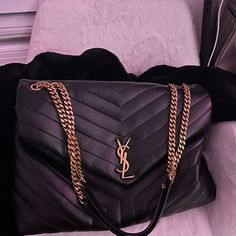 This Is The Large Ysl Shoulder Bag With Gold Chain And Gold Ysl Sign There Isn’t Many Of This Bag Still Out, This Bag Is Rare Especially The Gold Version. Taken Care Of Very Well, With Minor Stains. Still Great Condition! No Part Of The Leather Is Damaged. Gold Middle Part Is A Little Scratched. I Still Have The Little Baggie That It Comes In, To Protect The Bag. Ysl Sign, Ysl Shoulder Bag, Yves Saint Laurent Bags, Middle Part, Middle Parts, Quilted Leather, Ysl Bag, Gold Chain, Gold Chains