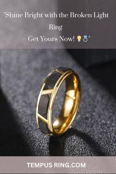 a gold ring with black carbon inlaying the center and an inscription that reads, shine bright with the broken light ring get yours now