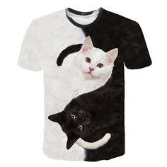 two black and white cats with their heads on each other's chest, all over a t - shirt