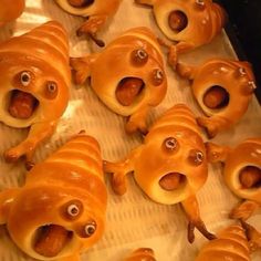 there are many hotdogs with googly eyes on them