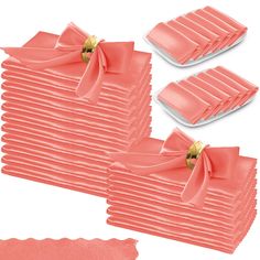 a stack of pink napkins with bows on them