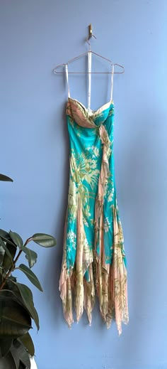 Gorgeous deadstock Diane Freis gown done in blue and pink floral silk. Handkerchief hem.  Aproximate size small. Please message for measurements. Summer Bias Cut Long Gown, Summer Green Floral Print Gown, Spring Silk Bias Cut Gown, Summer Silk Gown With Fitted Bodice, Fitted Silk Gown For Summer, Silk Maxi Dress With Floral Print And Fitted Bodice, Silk Maxi Dress With Fitted Bodice And Floral Print, Summer Silk Long Gown, Silk Floral Print Long Gown