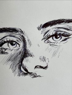 a black and white drawing of a woman's face with her eyes wide open