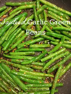 green beans cooking in a wok with salt and seasoning on the side text reads jalapeno garlic green beans