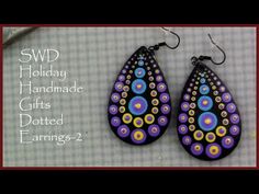 the earrings are made from polymer and have colorful circles on them