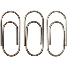 three metal paper clips on a white background