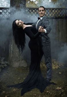 35+ Halloween Couple Costume Ideas That Will Slay the Scene 5 Fancy Couple Halloween Costumes, Dracula And Wife Costume, Maleficent Couples Costume, Adams Family Couple Costume, Goth Couple Halloween Costume Ideas, Dark Halloween Costumes Couples, Michael Meyers Couple Costumes, Wednesday Couple Costume