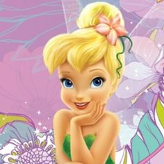 the tinkerbell is smiling with her hand on her chin