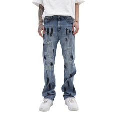 Add a touch of edgy style to your wardrobe with these Urban High Street Graffiti Ripped Jeans. Featuring a unique graffiti design and trendy distressed details, these jeans are perfect for the fashion-forward individual who likes to stand out from the crowd. Made from high-quality denim, these jeans are not only stylish but also durable and comfortable to wear. Features: - 100% Cotton -Premium Denim Fabric -Mid-rise Waist -Graffiti -Pre-made Holes -Straight leg -Street Style Hip Hop Style Distressed Straight Leg Jeans, Distressed Straight Leg Jeans Hip Hop Style, Distressed Straight Leg Jeans In Hip Hop Style, Edgy Graphic Print Jeans For Spring, Edgy Blue Cotton Jeans, Blue Graphic Print Jeans For Fall, Edgy Spring Jeans With Graphic Print, Edgy Blue Bottoms For Streetwear, Ripped Cotton Jeans Y2k Style