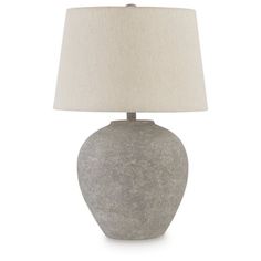 a gray table lamp with a white shade