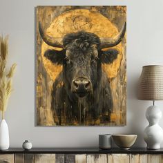 a painting of a bull with horns on it's head in front of a yellow moon