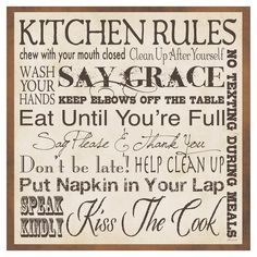 a kitchen rules sign hanging on the wall