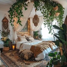 a bedroom with plants hanging from the ceiling