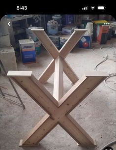 a wooden sculpture sitting on top of a table