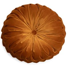 a brown round pillow on a white background