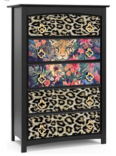 an animal print dresser with leopards and flowers on the front, in black wood