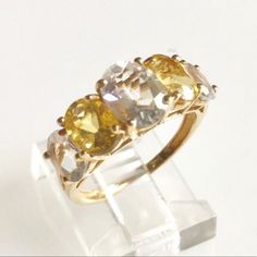 14k Lemon And Clear Quartz Crystal Ring 8.1mm X 6.1mm Center Oval 7mm X 5mm Oval Lemon Yellows 6mm X 4mm Oval End Stones Size Shy 6 2.6g Stamped Scbs. 14k Crystal Ring, White Quartz, Clear Quartz Crystal, Lemon Yellow, Crystal Rings, Womens Jewelry Rings, Gemstone Ring, Clear Quartz, Quartz Crystal