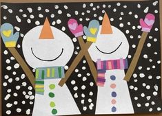 two snowmen with hats and scarfs are standing in the snow holding ski poles