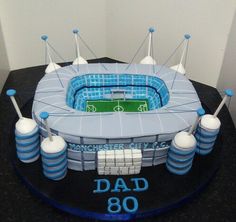 a cake made to look like a soccer stadium