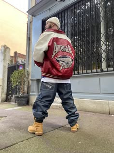 Red Streetwear Outfit, How To Style Timberlands, Varsity Jacket Outfit Mens, Style Timberland Boots, 90s Men Outfits, Avirex Leather Jacket, Red Jacket Outfit, History Tips