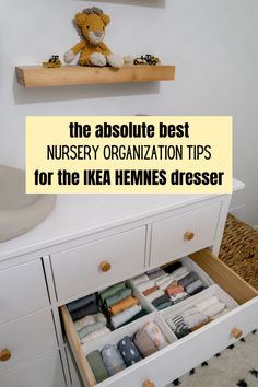 an open drawer in a bathroom with the words, the absolute best nursery organization tips for the ikea hemnes dresser