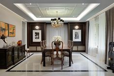 an elegant dining room with chandelier and marble flooring is seen in this image