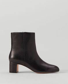 Made from luxe leather, our block heel booties go the extra mile. Pointy toe. Padded footbed for complete comfort. 2 1/4" heel.,Imported:Imported,Fabrication:Leather Block Heel Leather Bootie by Ann Taylor Size regular - 5 Black Women's Low, Booties, Footwear, Leather Black Leather Ankle Booties, Pointy Toe Boots Outfit, Black Heel Ankle Boots, Ankle Booties Outfit, Fall Ankle Boots, Boots Fall Ankle, Pointy Toe Boots, Booties Outfit, Pointed Toe Boots