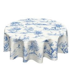 a blue and white tablecloth with trees on it