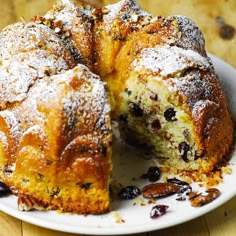 a bundt cake is cut into pieces on a plate