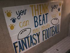 a sign on the side of a wall that says, you think i can beat new that's fantasy football