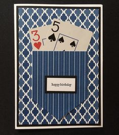 a birthday card with playing cards in the pocket and number 5 on it, which reads happy birthday