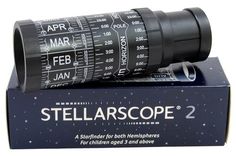 a pair of telescopes sitting on top of a box with the words stellarscope 2 printed on it