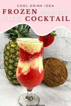 a frozen drink in a glass next to a pineapple