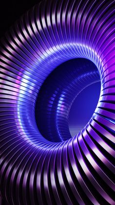 an image of a purple spiral design in the dark