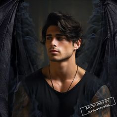 a man in black shirt with dragon wings around his neck