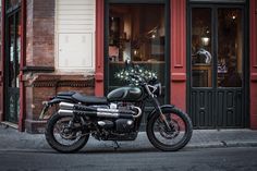 a motorcycle parked in front of a store